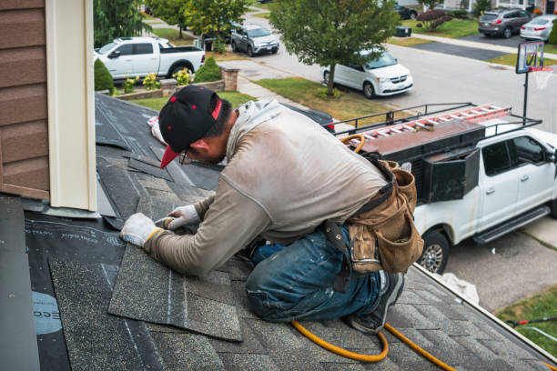 Professional Hail Damage Roof Repair technician working in Ridgecrest, CA